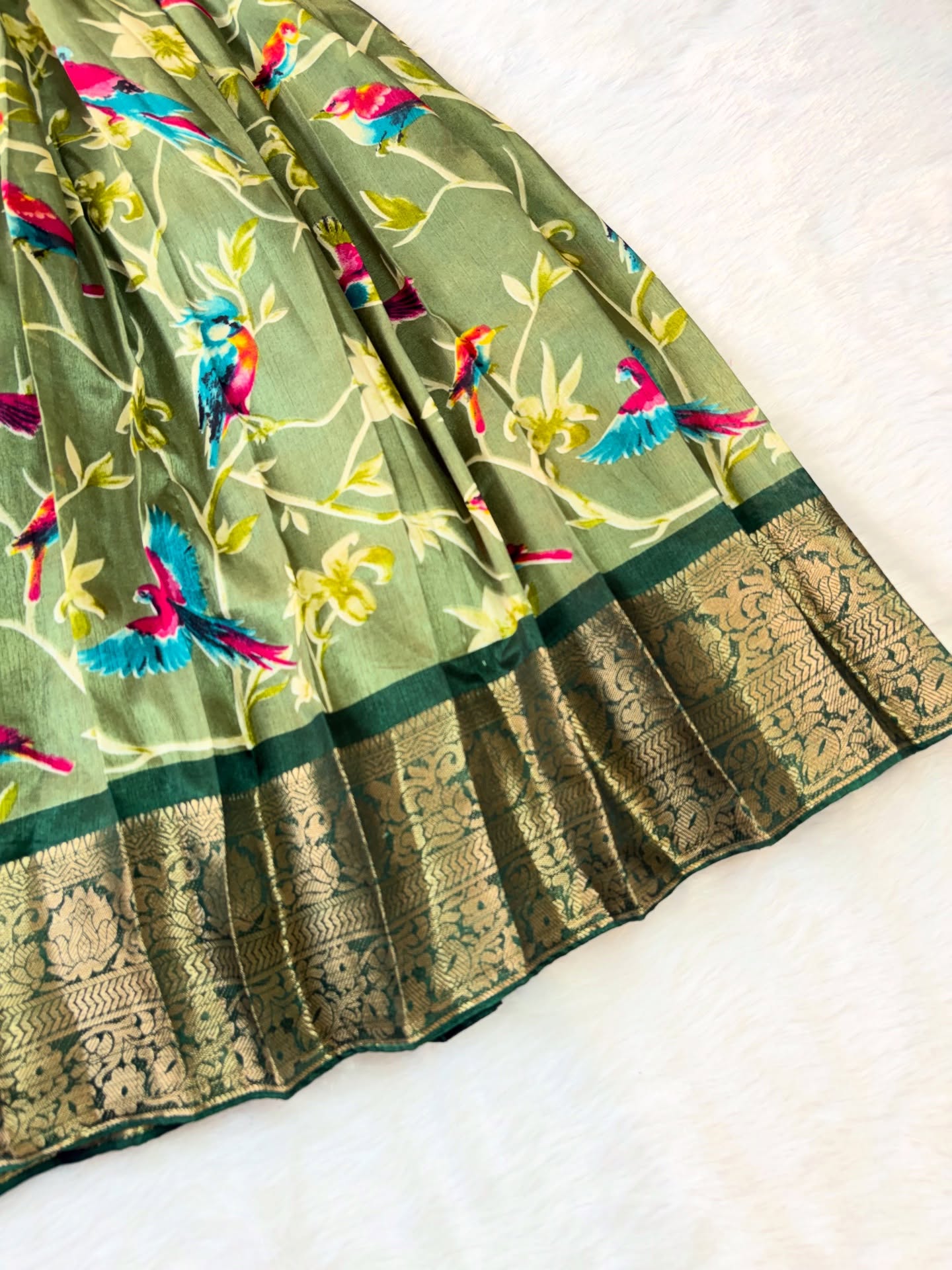 Stunning olive green long frock featuring a delicate bird design