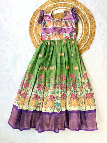 Kids long frock in a graceful olive green shade, paired with a vibrant violet border
