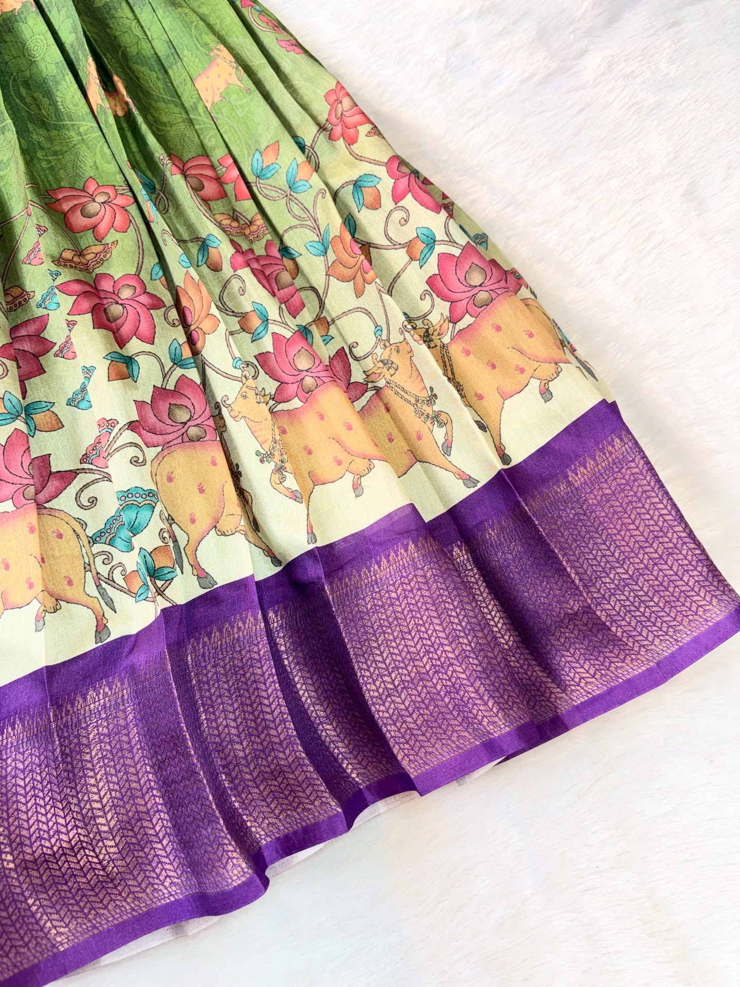 Kids long frock in a graceful olive green shade, paired with a vibrant violet border