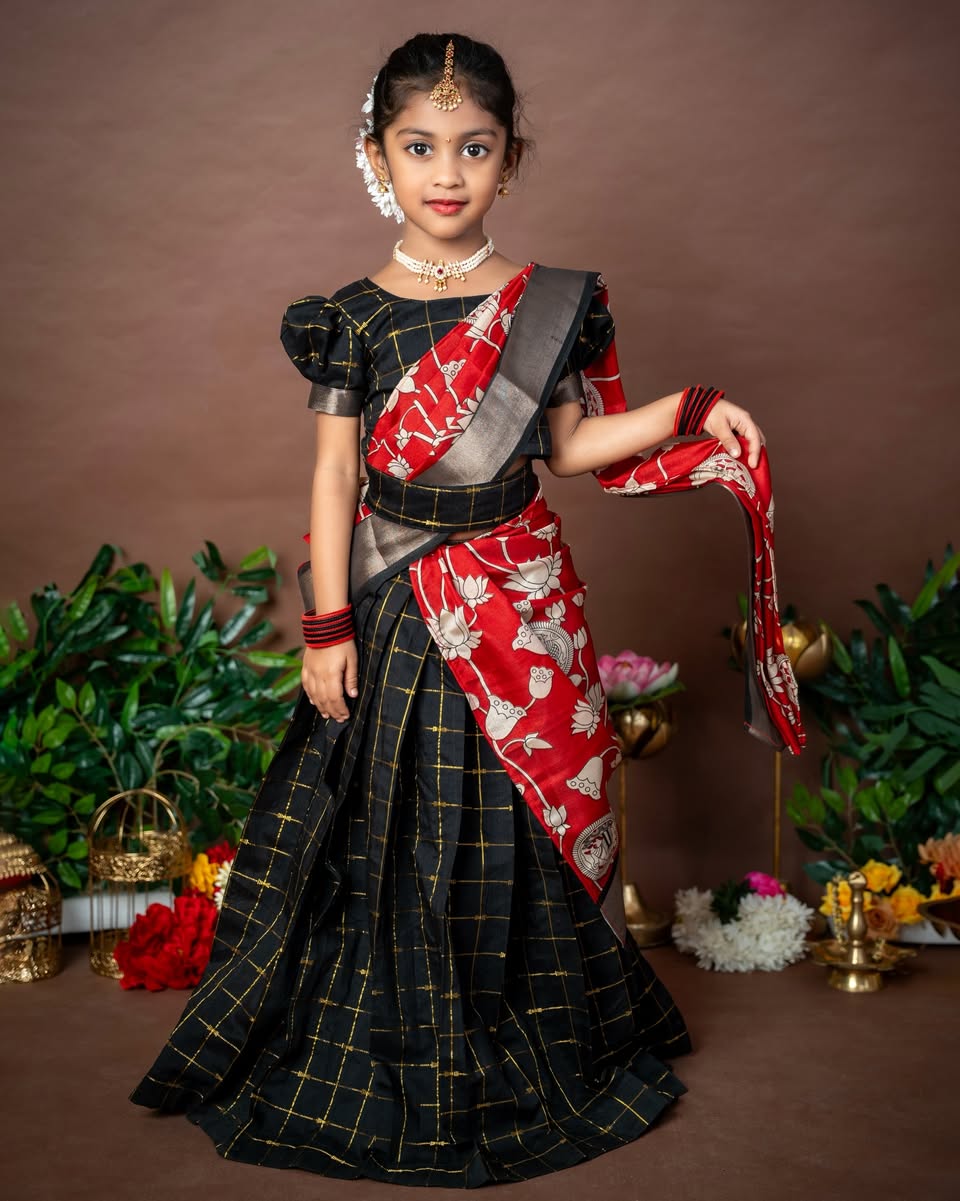 NEELAMBARI – Premium Raw Silk Checked Paavadai Sattai paired with a stunning Kalamkari duppatta with Hipbelt