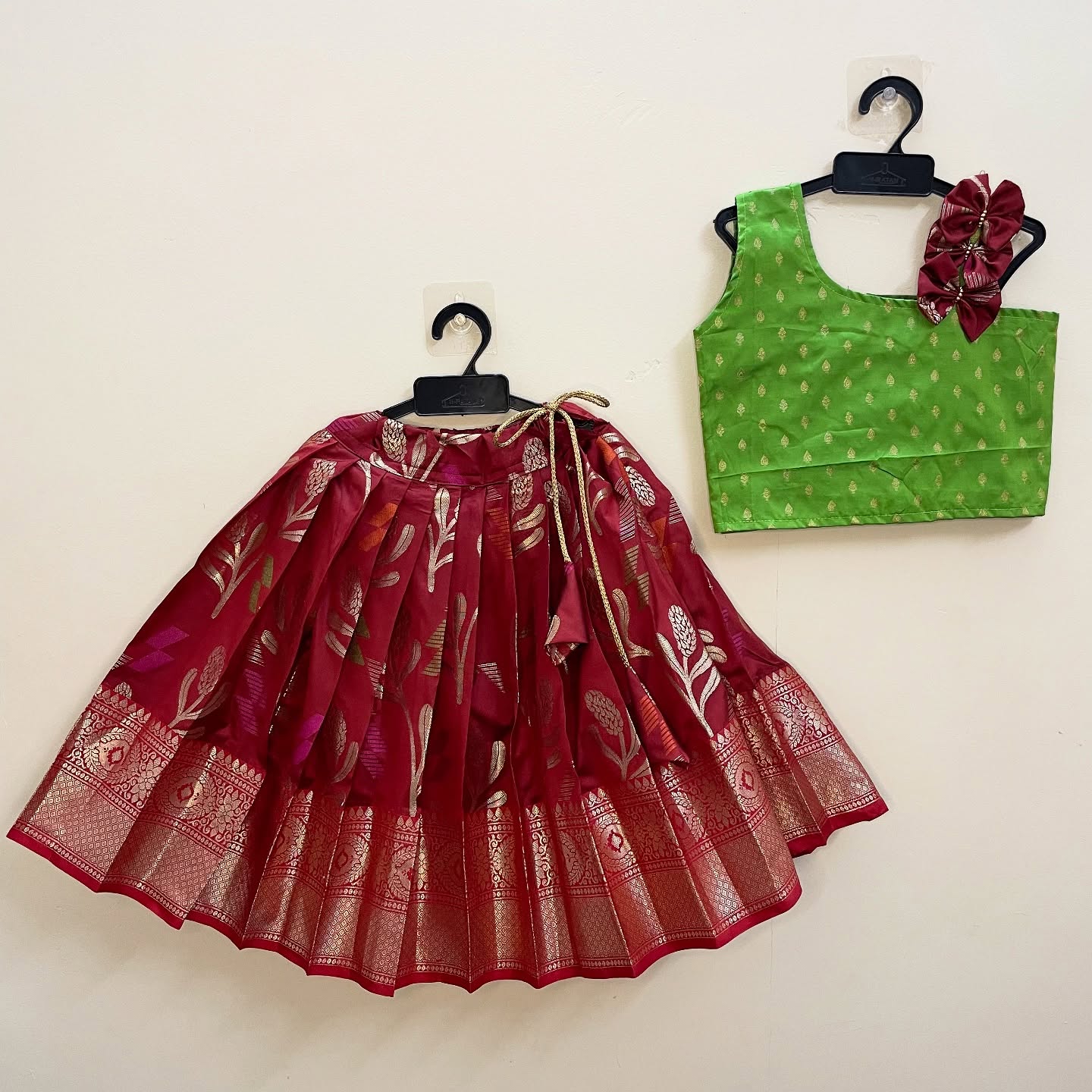 Maroon and Light Green Pattu Paavadai Sattai is specifically made for little princesses