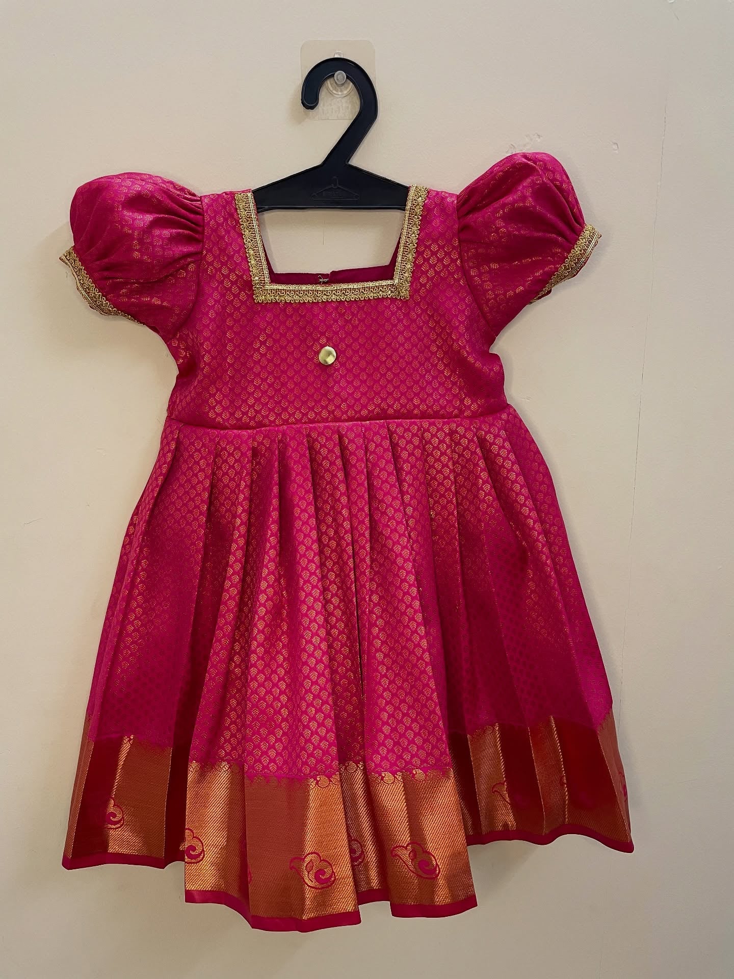Adorn your princess in this pink semi Kanchipattu frock