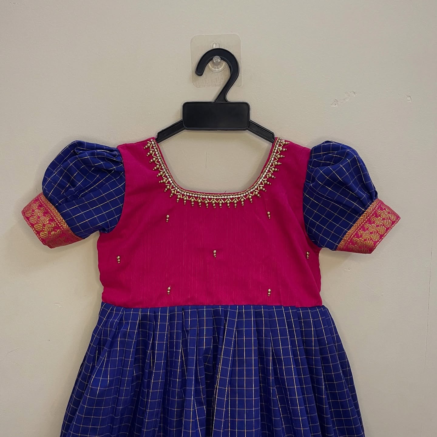 Pure comfort and elegance with our Handloom Kalyani Silk Frock, Red and Blue specially designed for delicate baby skin