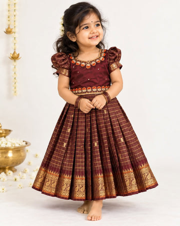 AATHIRAI - A rich maroon & gold traditional dress crafted for those beautiful festive moments