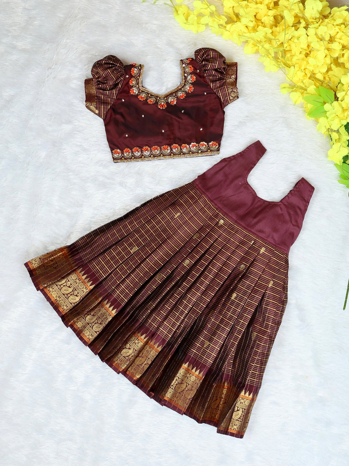 AATHIRAI - A rich maroon & gold traditional dress crafted for those beautiful festive moments