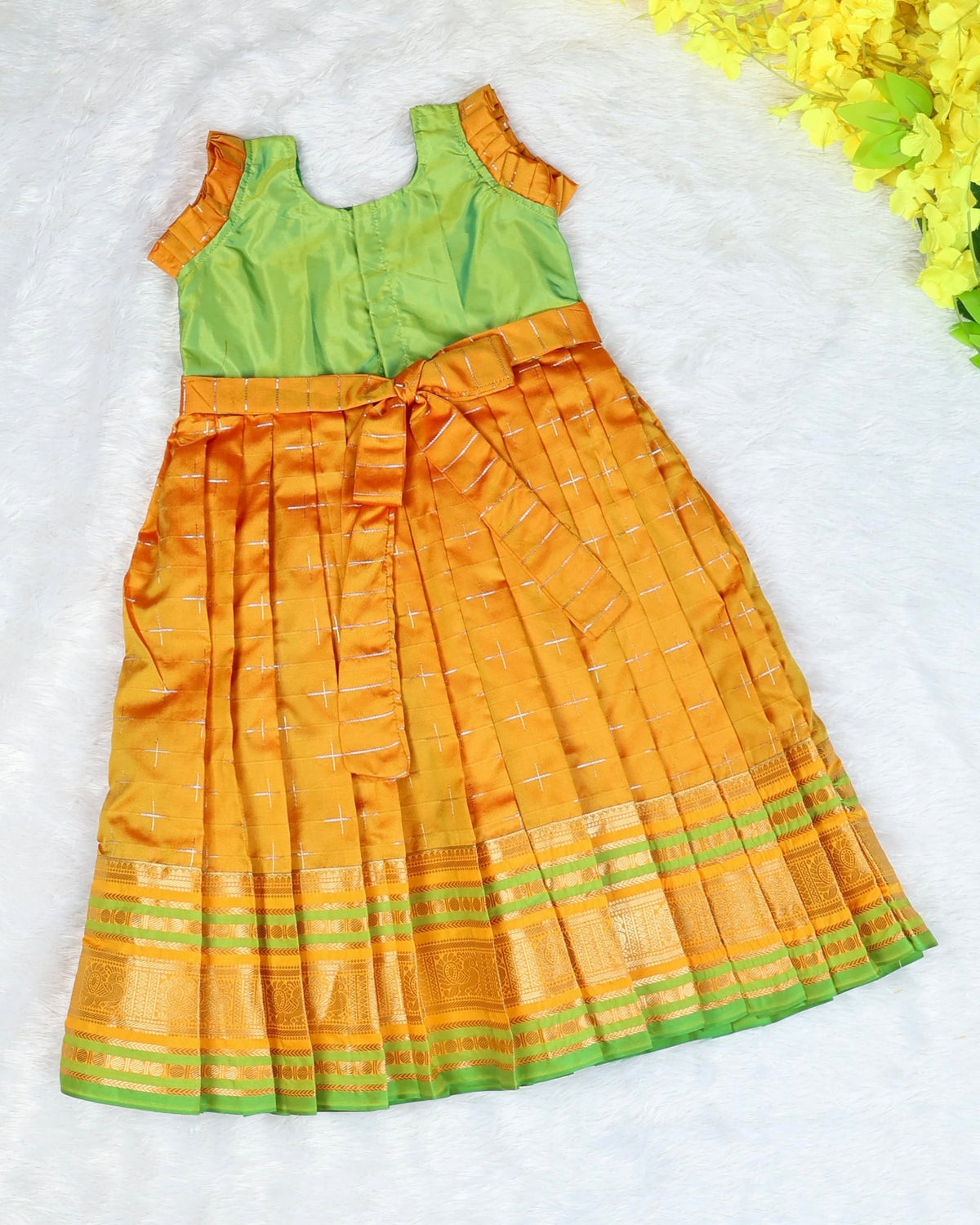 LAYA - A beautiful green & Mustard Yellow traditional long frock with an intricate elephant motif embellishment