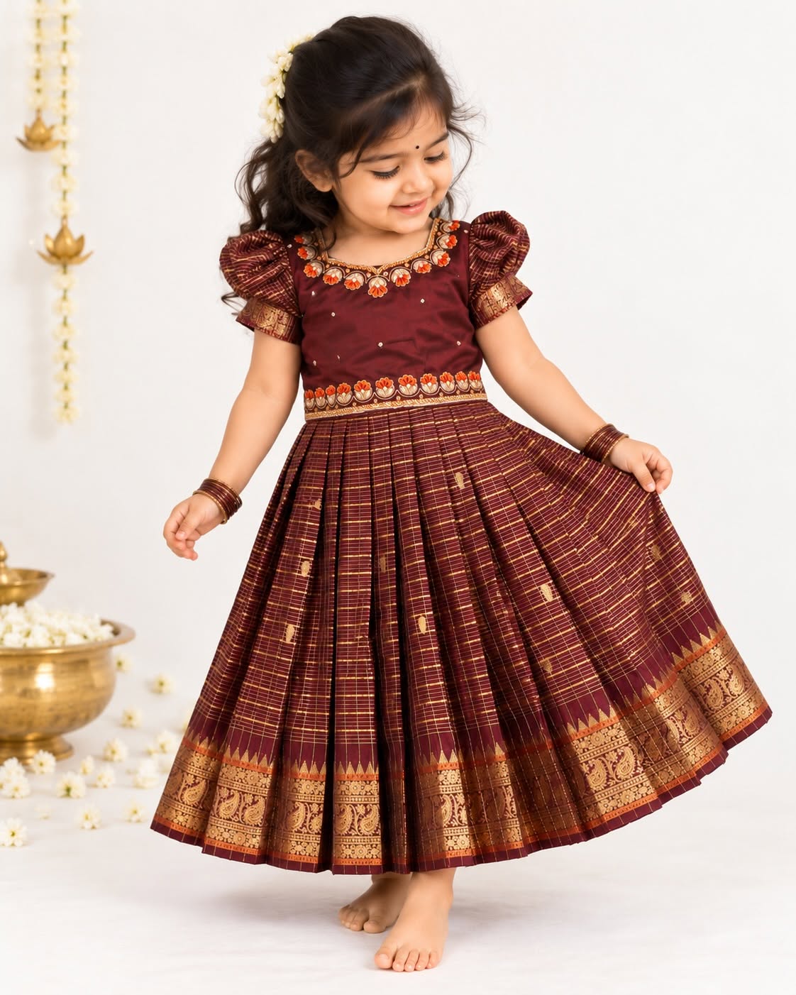 AATHIRAI - A rich maroon & gold traditional dress crafted for those beautiful festive moments