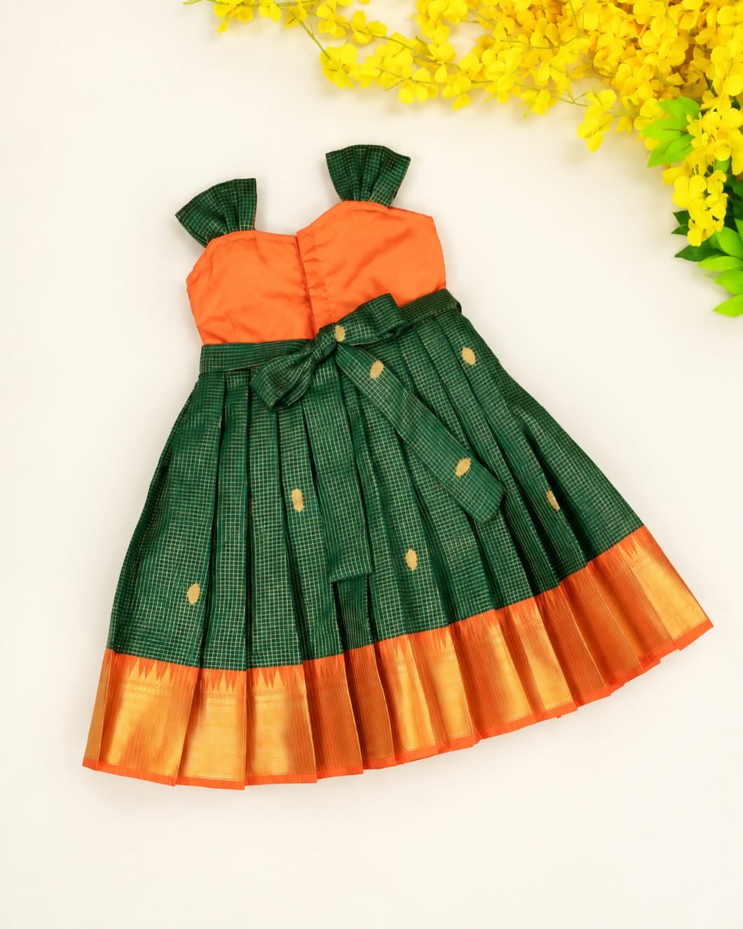 SAYURI - Classic Deep Green & Vibrant Orange Pattu Frock