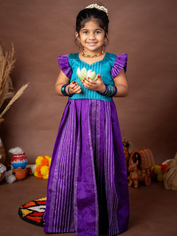 Ramar Blue and Purple Silk Long Frock is crafted to make celebrations truly memorable