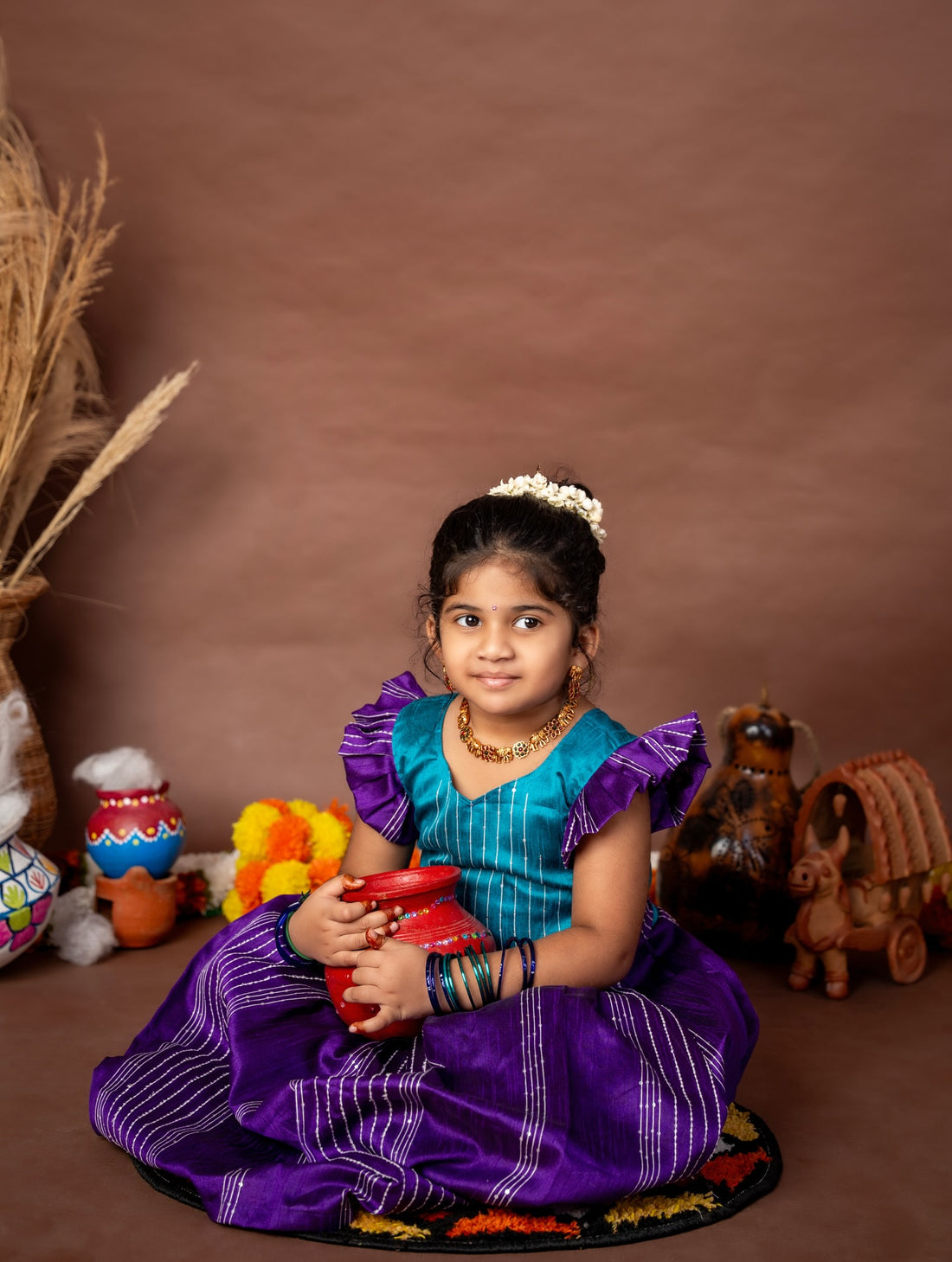 Ramar Blue and Purple Silk Long Frock is crafted to make celebrations truly memorable