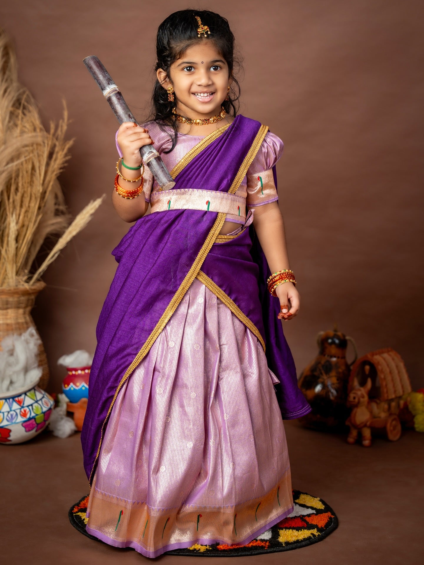 Lilac Skirt–Top set paired with a contrast Purple Thavani