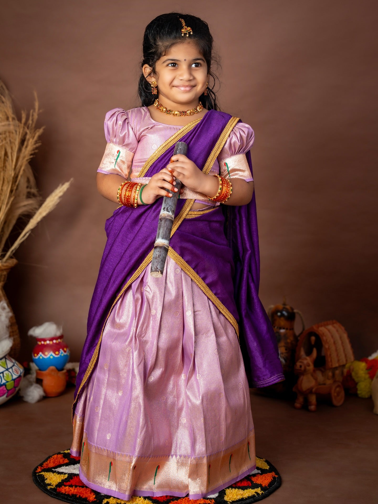 Lilac Skirt–Top set paired with a contrast Purple Thavani