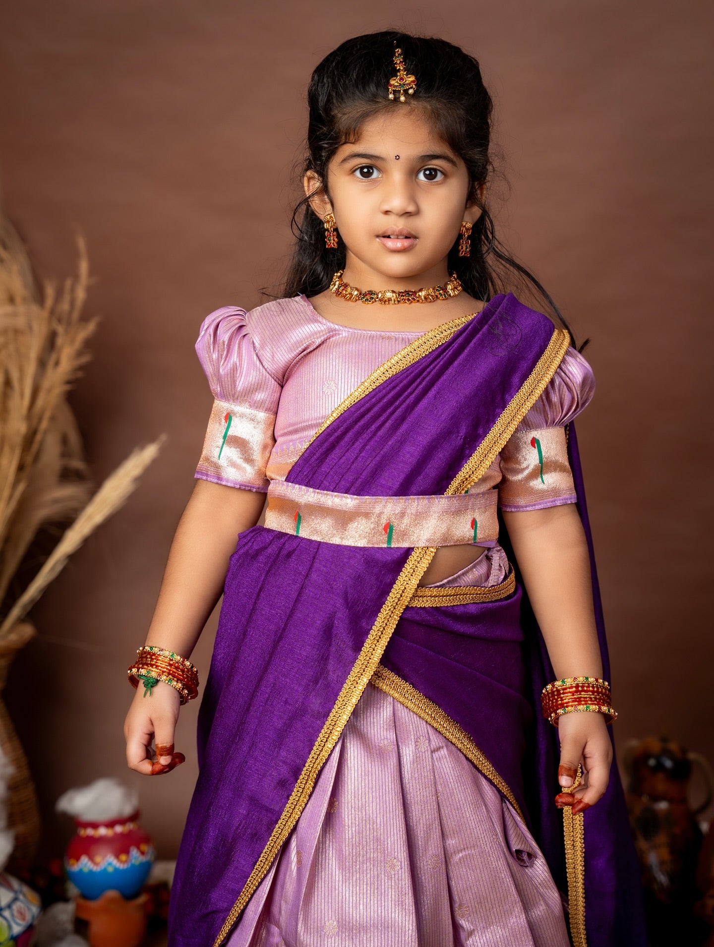 Lilac Skirt–Top set paired with a contrast Purple Thavani