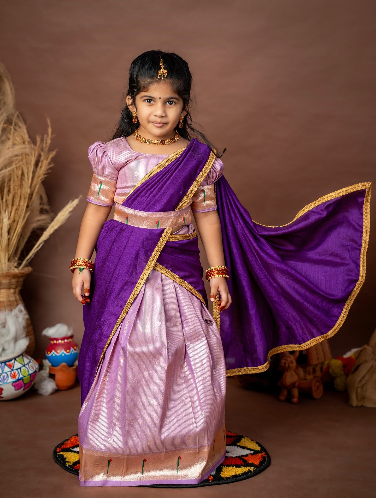 Lilac Skirt–Top set paired with a contrast Purple Thavani