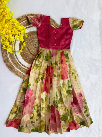 Elevate your little girl’s festive look with our beautifully crafted silk frock - Pink and Cream Combo