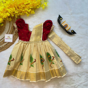 Maroon Color and Traditional Peacock Feather Motif Kasavu Frock with attached Duppatta