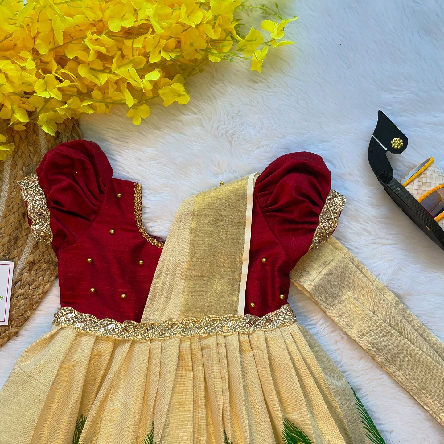 Maroon Color and Traditional Peacock Feather Motif Kasavu Frock with attached Duppatta