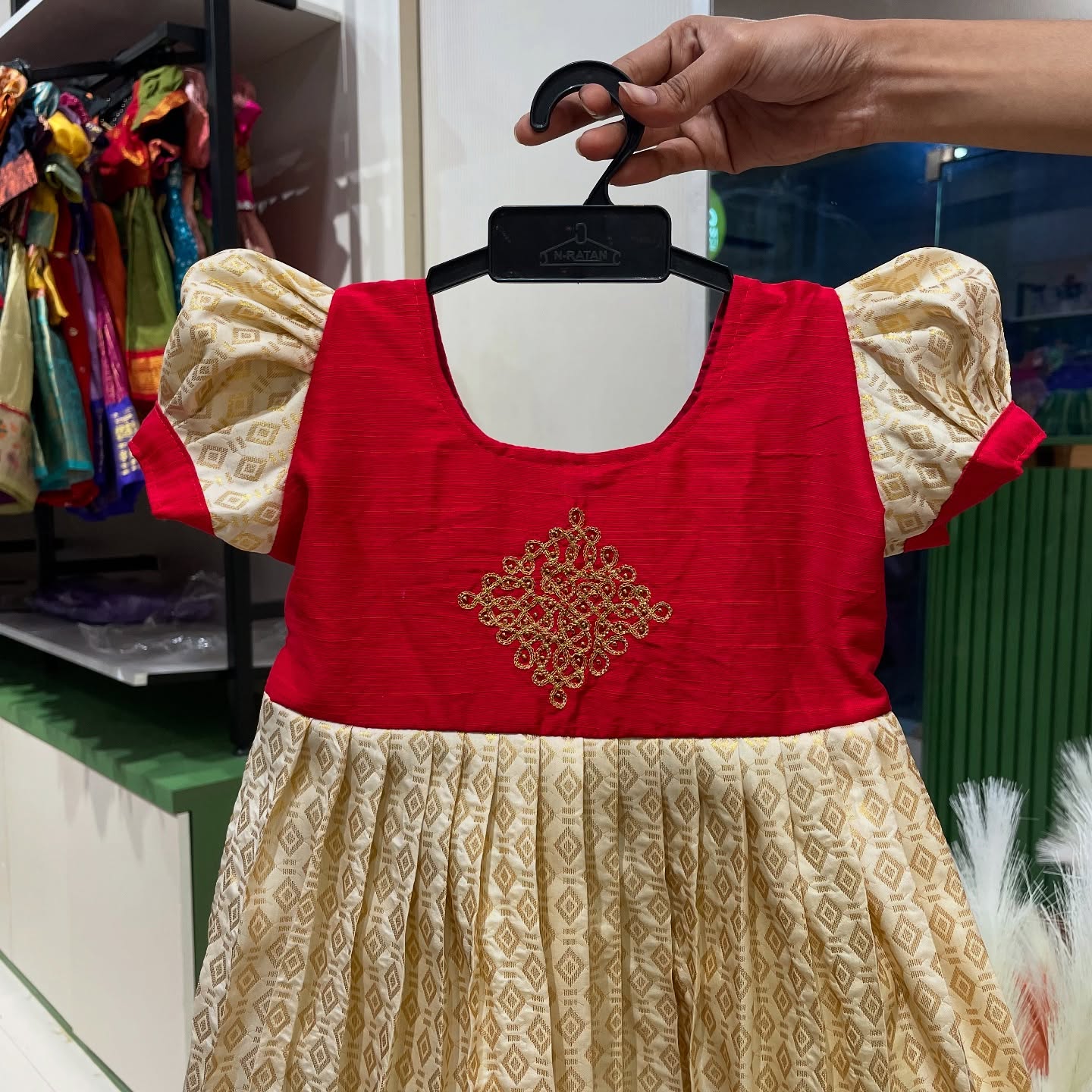 Kolam Design in Red Raw Silk with Cream color semi kanchipattu frock