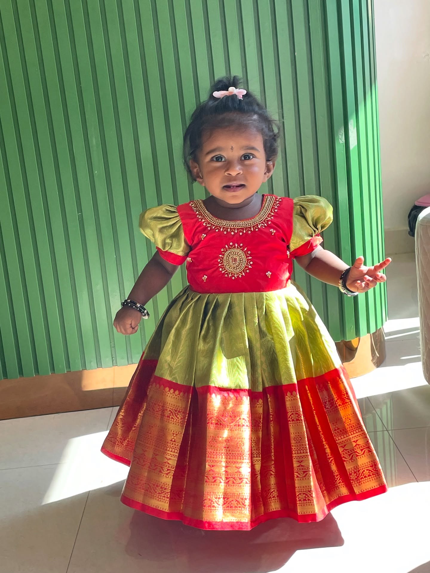 Green and Red - Traditional pattu frock adorned with delicate aariwork design