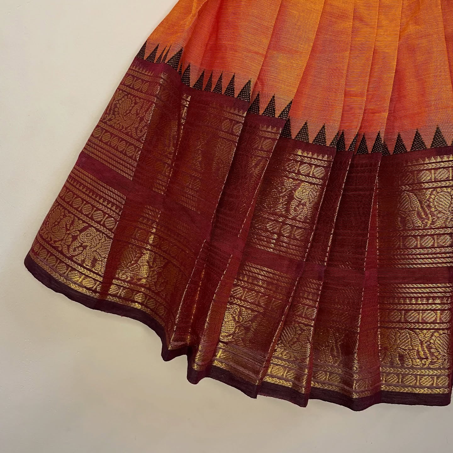 Narumugai Authentic Kanchi cotton Paavadai Sattai with traditional zari border – Orange and Maroon Color Combo