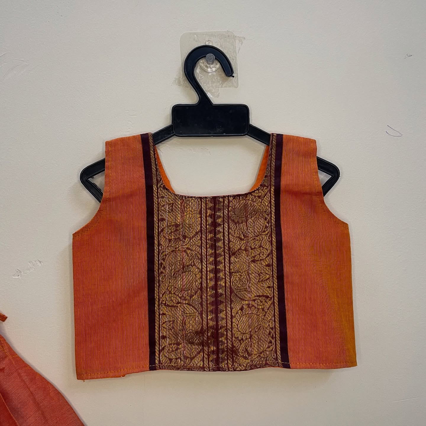 Narumugai Authentic Kanchi cotton Paavadai Sattai with traditional zari border – Orange and Maroon Color Combo