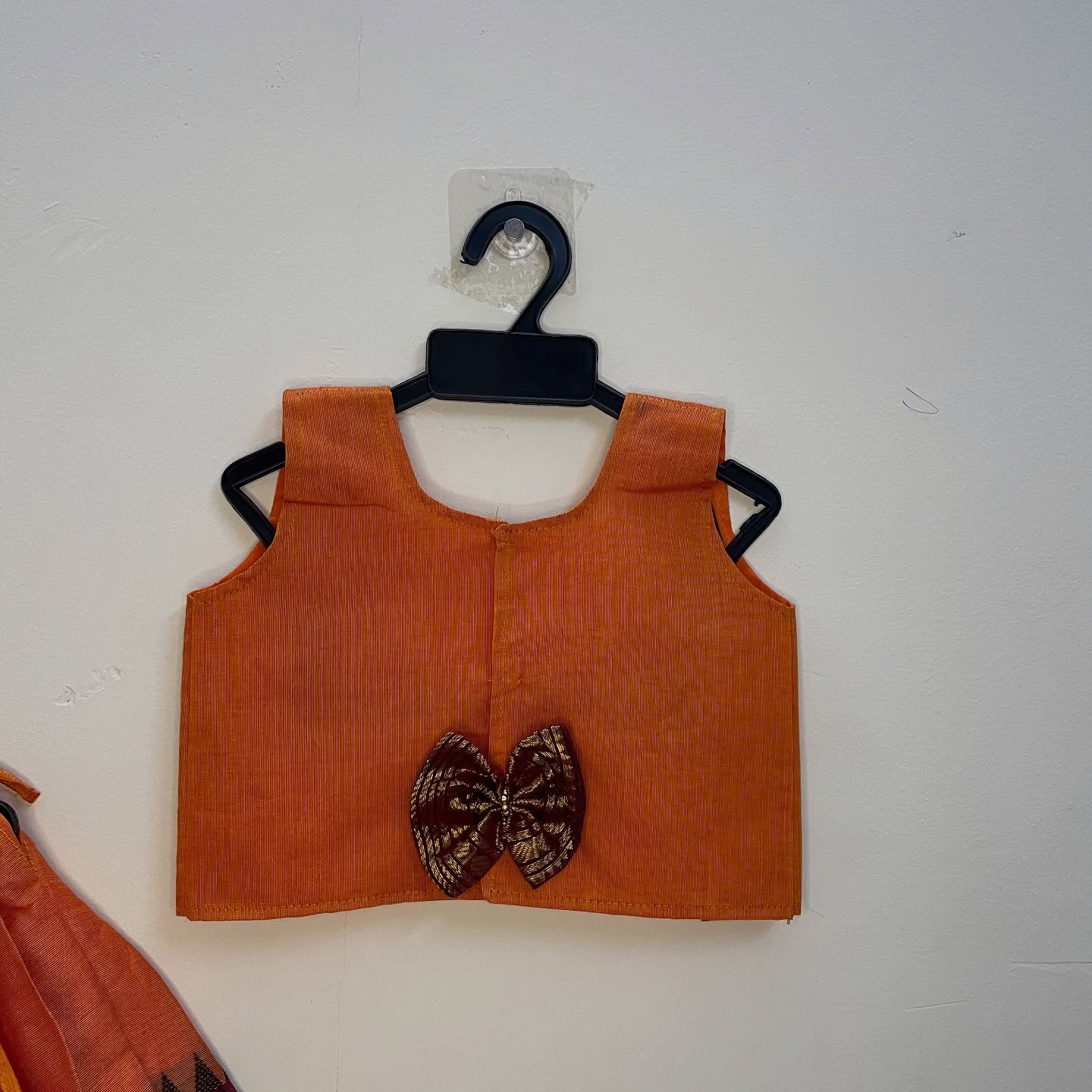 Narumugai Authentic Kanchi cotton Paavadai Sattai with traditional zari border – Orange and Maroon Color Combo
