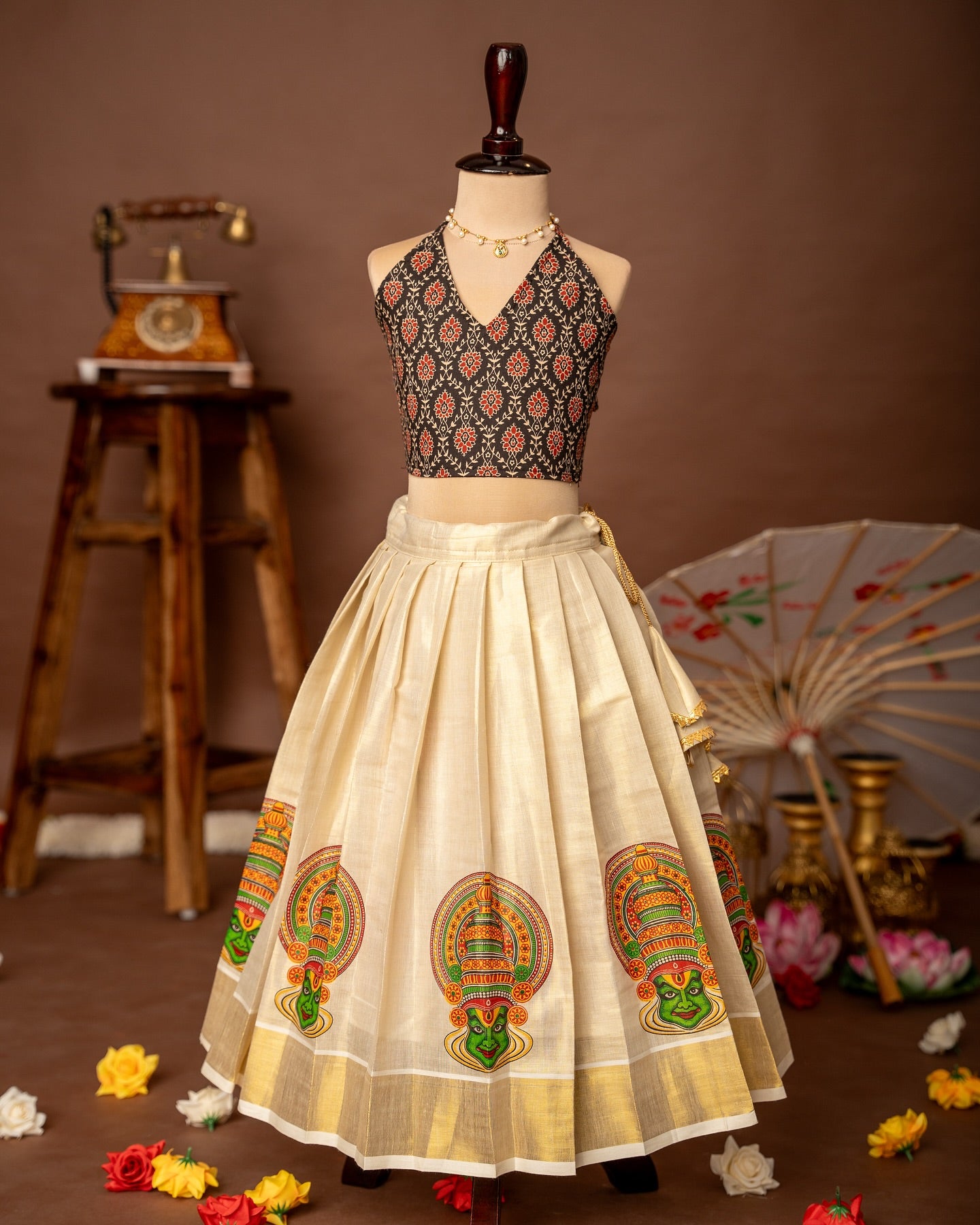 Black Ajrakh Halter Neck Top and Traditional Kathakali Motif Kasavu Skirt – Minmini Onam Collections