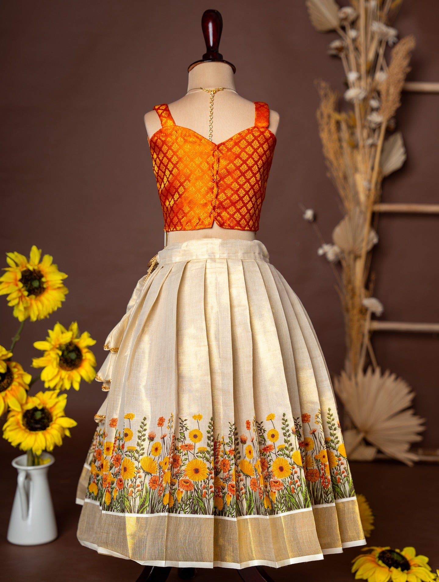 Orange Brocade Silk Top and Traditional Floral Motifs Kasavu Skirt – Minmini Onam Collections