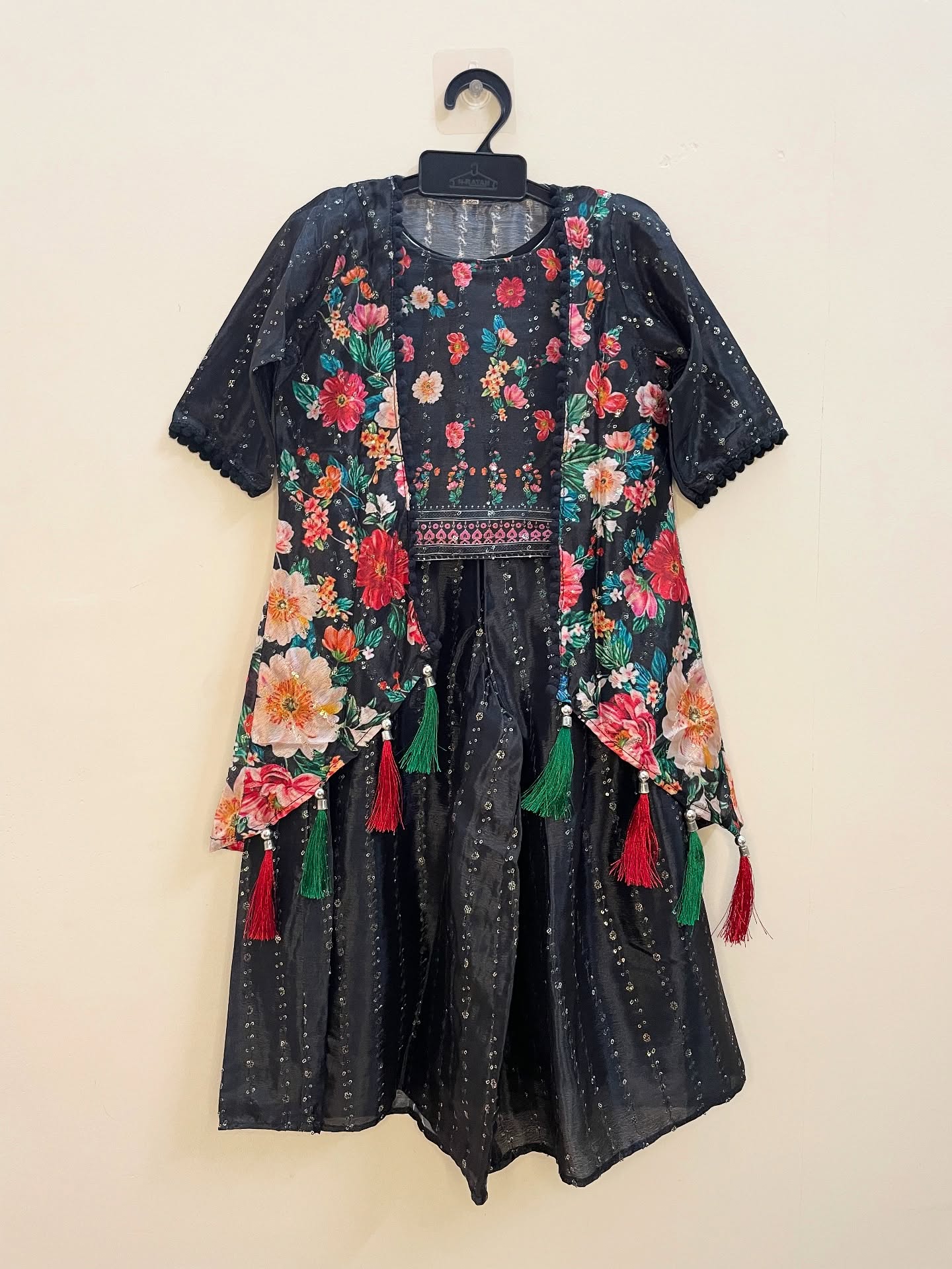 Effortlessly chic and stylish, this Black Palazzo Set with Shrug