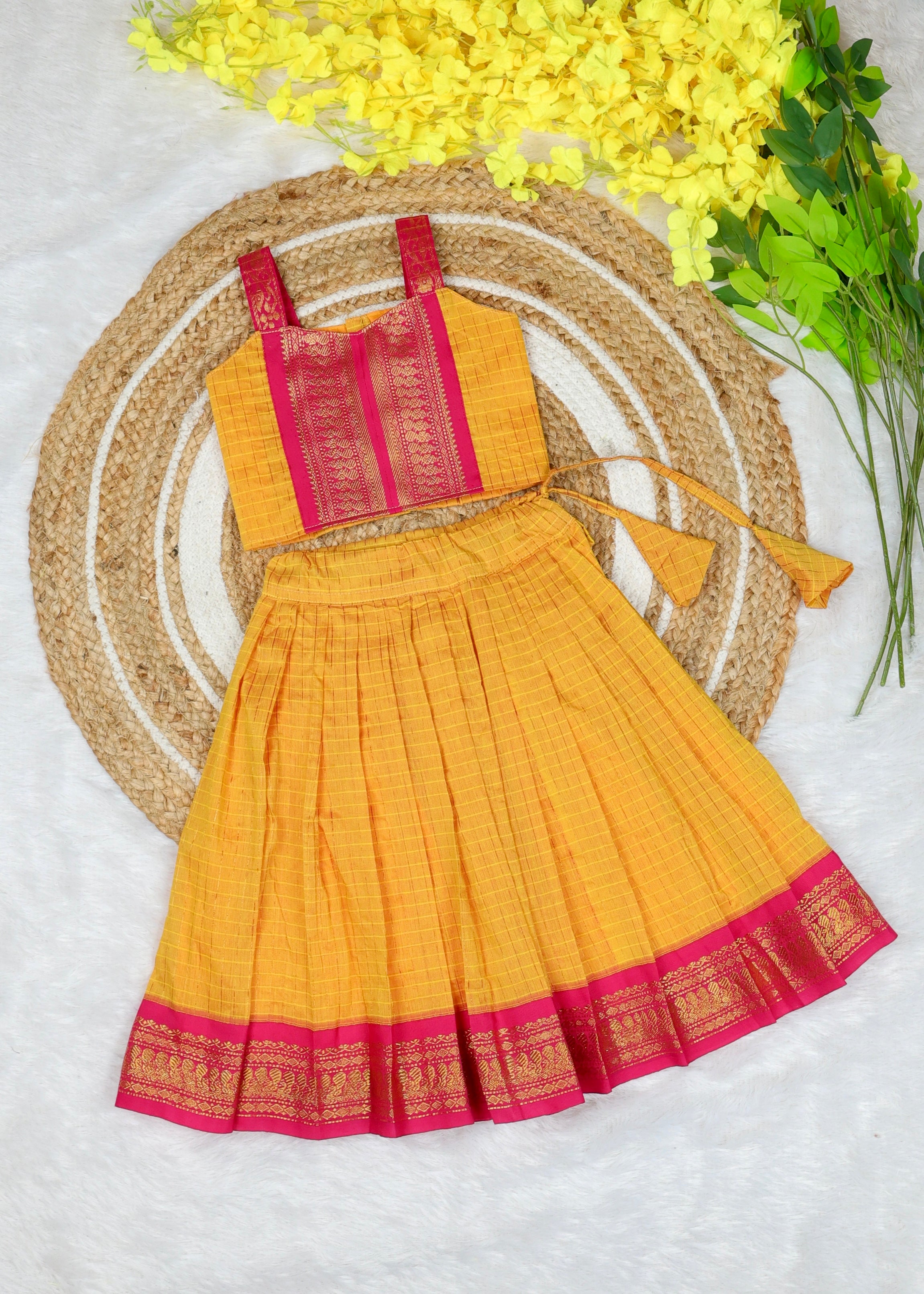 Celebrate the beauty of tradition with our Kalyani Silk Cotton Skirt & Top Set - Yellow and Pink Combo