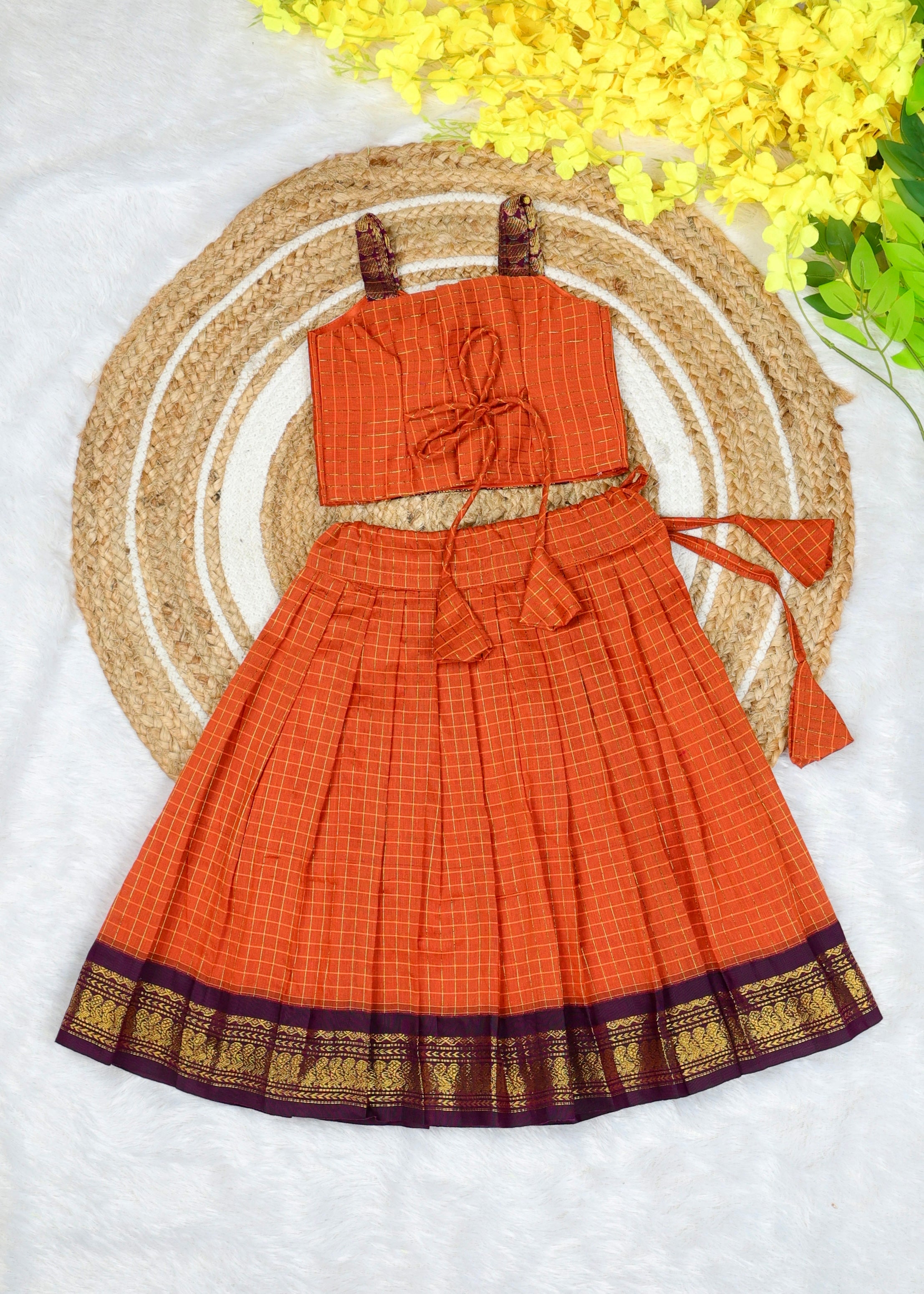 Celebrate the beauty of tradition with our Kalyani Silk Cotton Skirt & Top Set - Orange and Dark Purple Combo