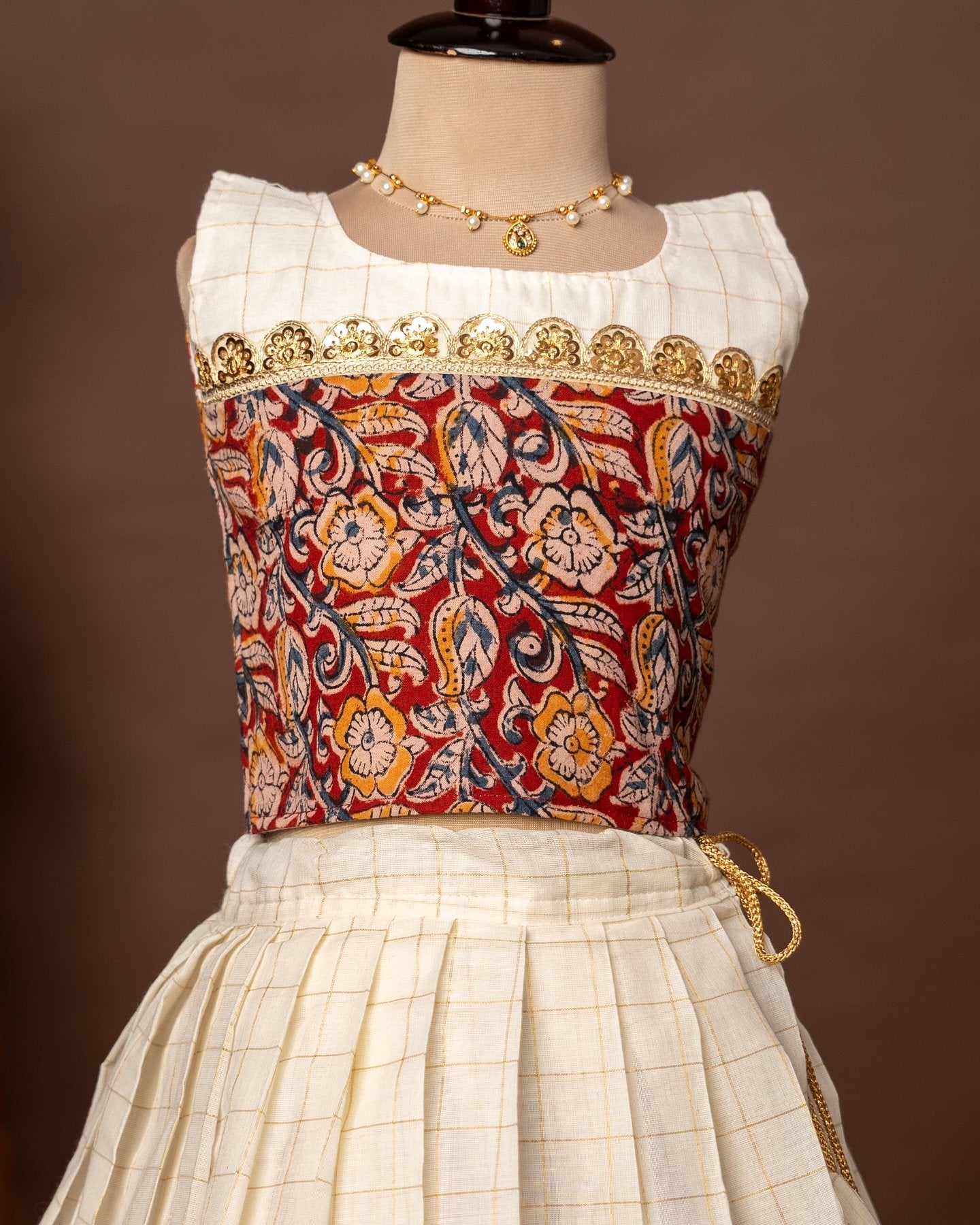 Maroon Kalamkari Sleeveless Top and Checked Kasavu Cotton Skirt – Minmini Onam Collections