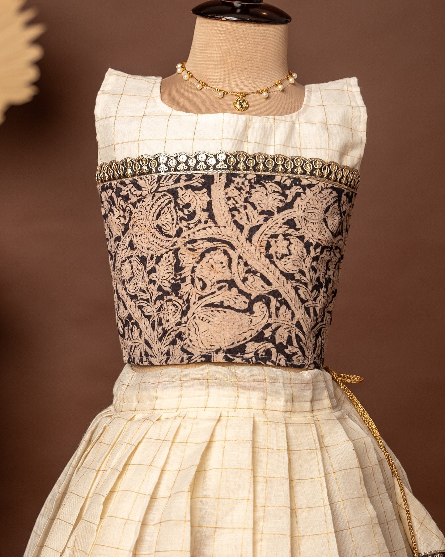 Black Kalamkari Sleeveless Top and Checked Kasavu Cotton Skirt – Minmini Onam Collections