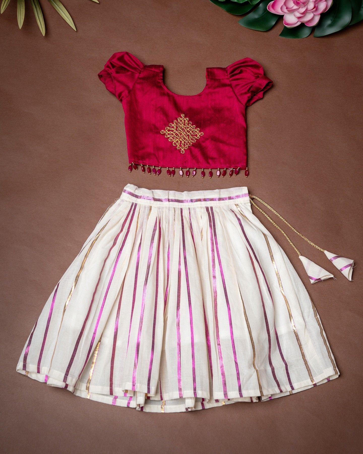 Purple Color Top with Kolam aariwork and Stripe Design Kasavu Skirt – Minmini Onam Collections