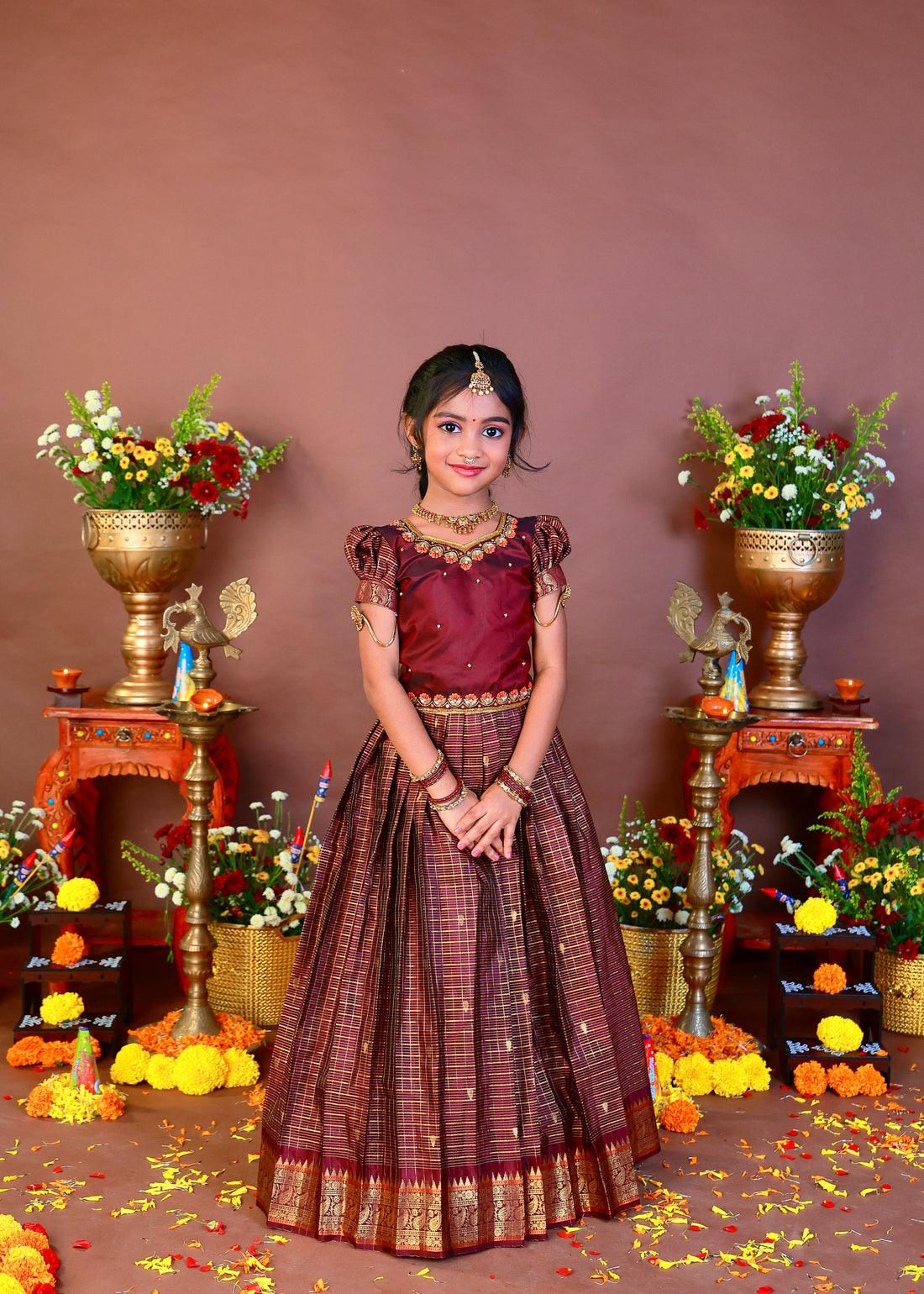 AATHIRAI - A rich maroon & gold traditional dress crafted for those beautiful festive moments