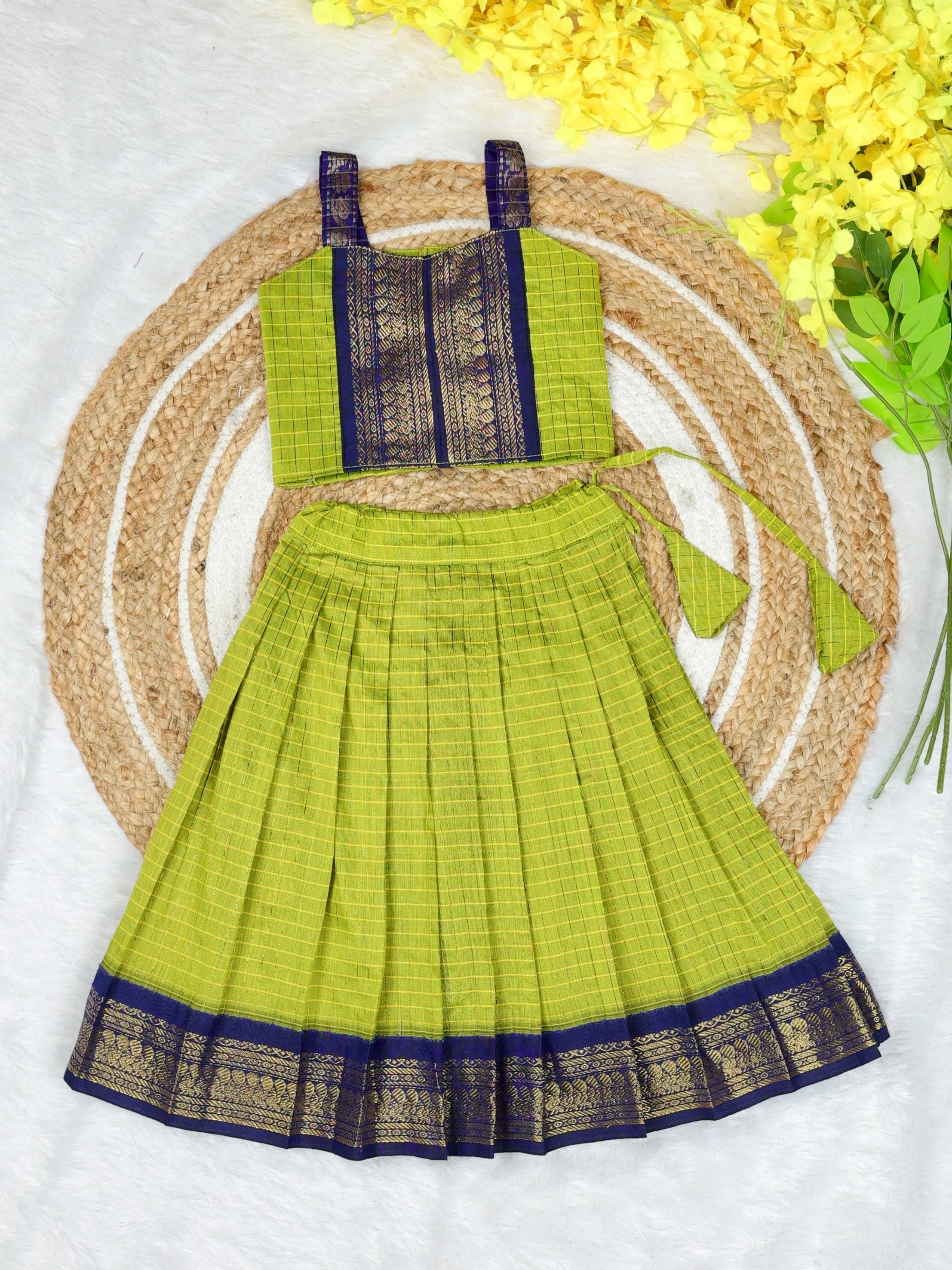 Celebrate the beauty of tradition with our Kalyani Silk Cotton Skirt & Top Set -Light Green and Dark Blue Combo