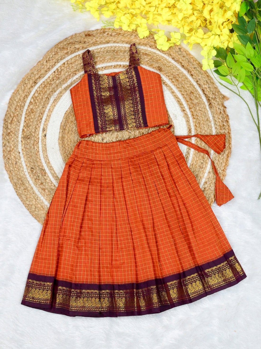 Celebrate the beauty of tradition with our Kalyani Silk Cotton Skirt & Top Set - Orange and Dark Purple Combo