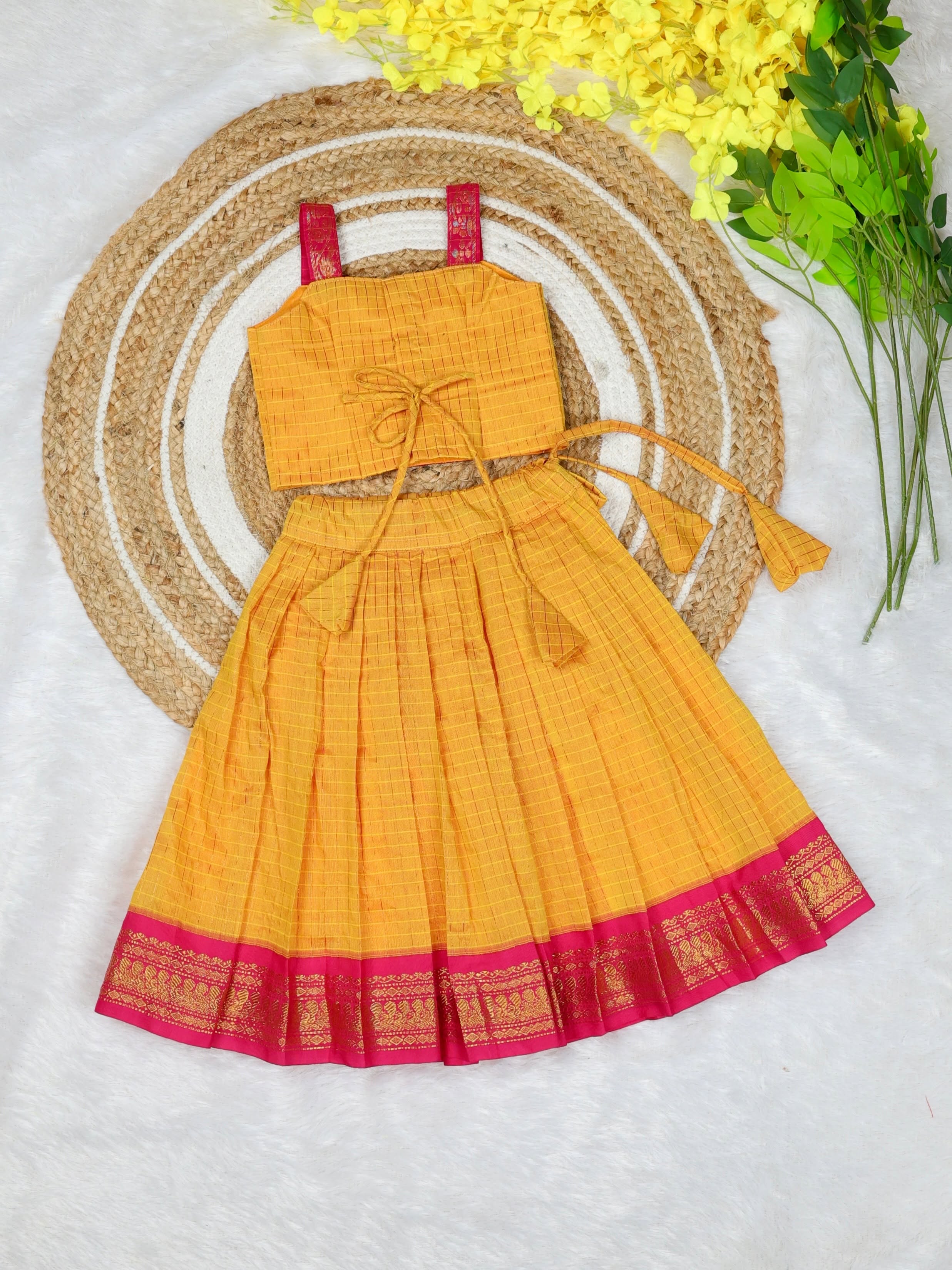 Celebrate the beauty of tradition with our Kalyani Silk Cotton Skirt & Top Set - Yellow and Pink Combo