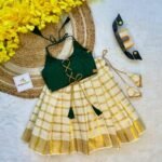 Dark Green Butter Silk Top with Kerala Cotton Checked Design Kasavu Skirt in Golden Zari - (Pre Booking) Onam Special