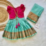 Light Blue 1000 butta semi Kanchipattu Frock with Pink Color Semi Silk Jacket & Matching Mom Saree (Pre Booking)