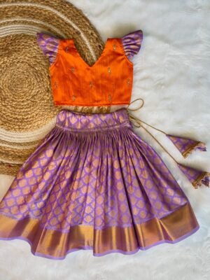 French Lilac Color Semi Kanchipattu Skirt & Mango Orange Color Raw Silk Top (Pre Booking)