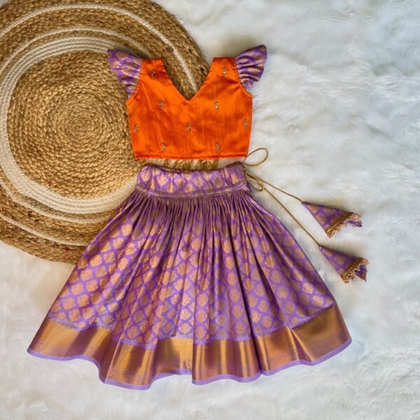 French Lilac Color Semi Kanchipattu Skirt & Mango Orange Color Raw Silk Top (Pre Booking)