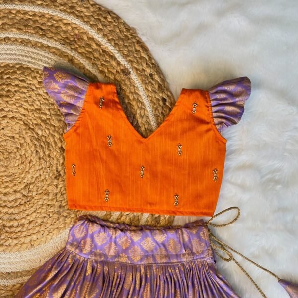 French Lilac Color Semi Kanchipattu Skirt & Mango Orange Color Raw Silk Top (Pre Booking)