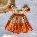 Golden Cream & Orange Premium Semi Kanchipattu Frock - (Pre Booking)