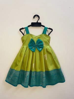 Vibrant green-blue Paithani silk frock designed with simple strap shoulders for a modern yet traditional appeal (Ready to Dispatch)