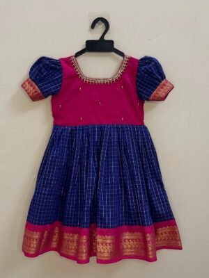 Pure comfort and elegance with our Handloom Kalyani Silk Frock, Red and Blue specially designed for delicate baby skin (Pre Booking)